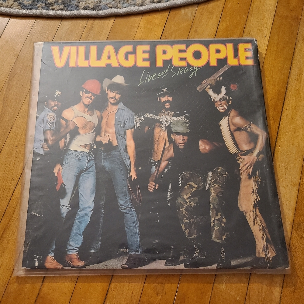 Village People live and Sleazy vintage record album. Black LP EUC